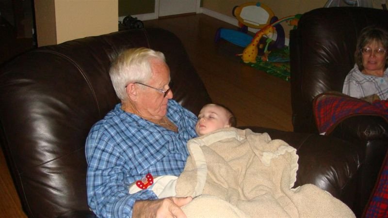 Trey Sleeping in Pa's Arms